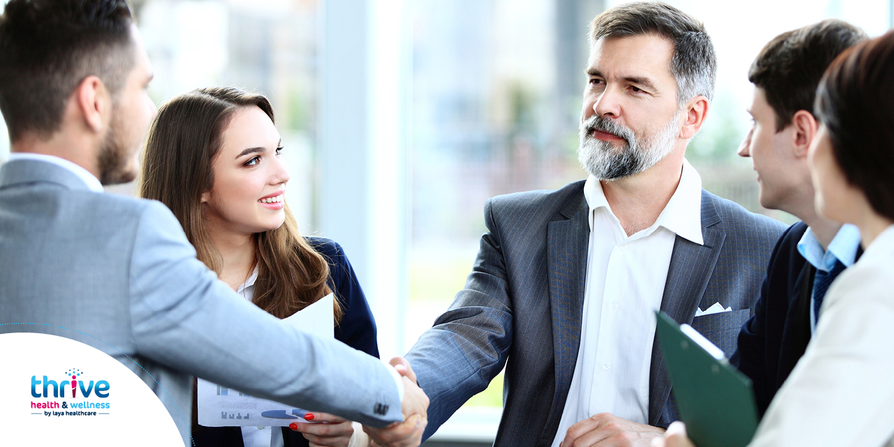 Picture of return to work - people shaking hands